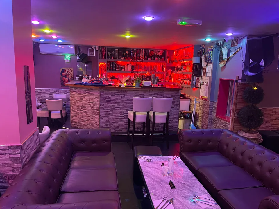The lounge and illuminated bar at Wazobia