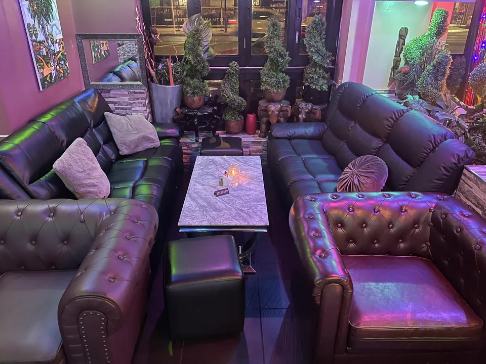 Lounge seating and tables at Wazobia
